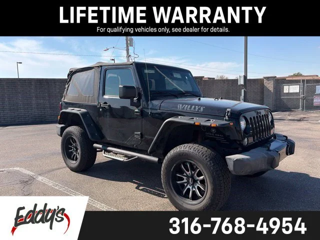 Used 2017 Black Clearcoat Jeep Willys Wheeler image 1