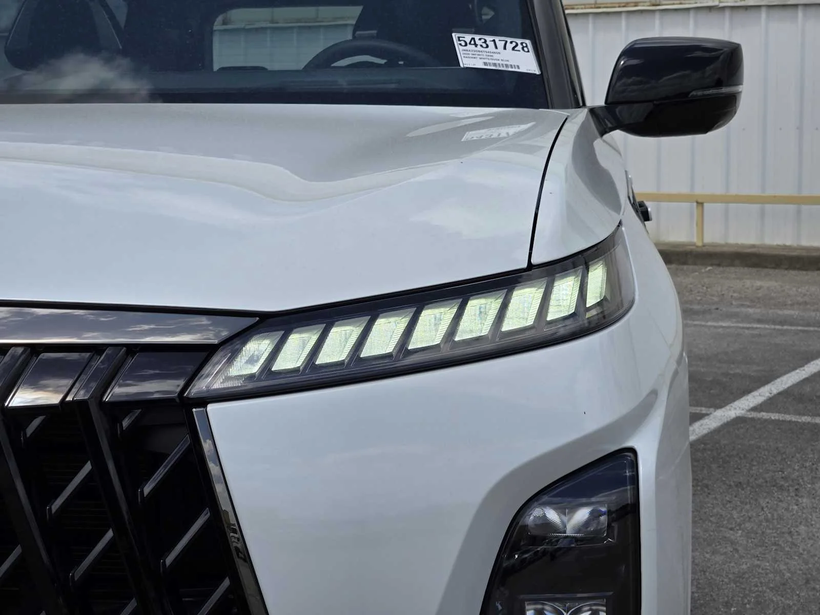 New 2026 RADIANT WHITE INFINITI Sport 4WD image 5