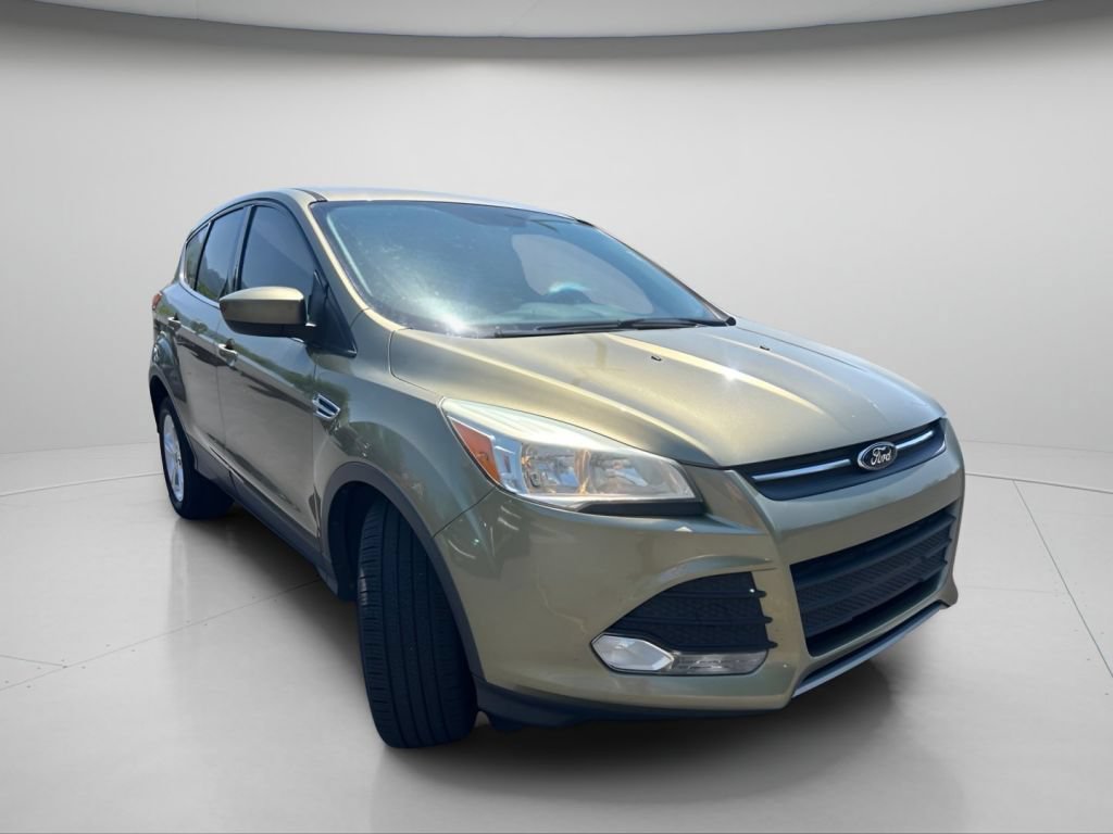 Used 2013 Ginger Ale Metallic Ford SE image 2
