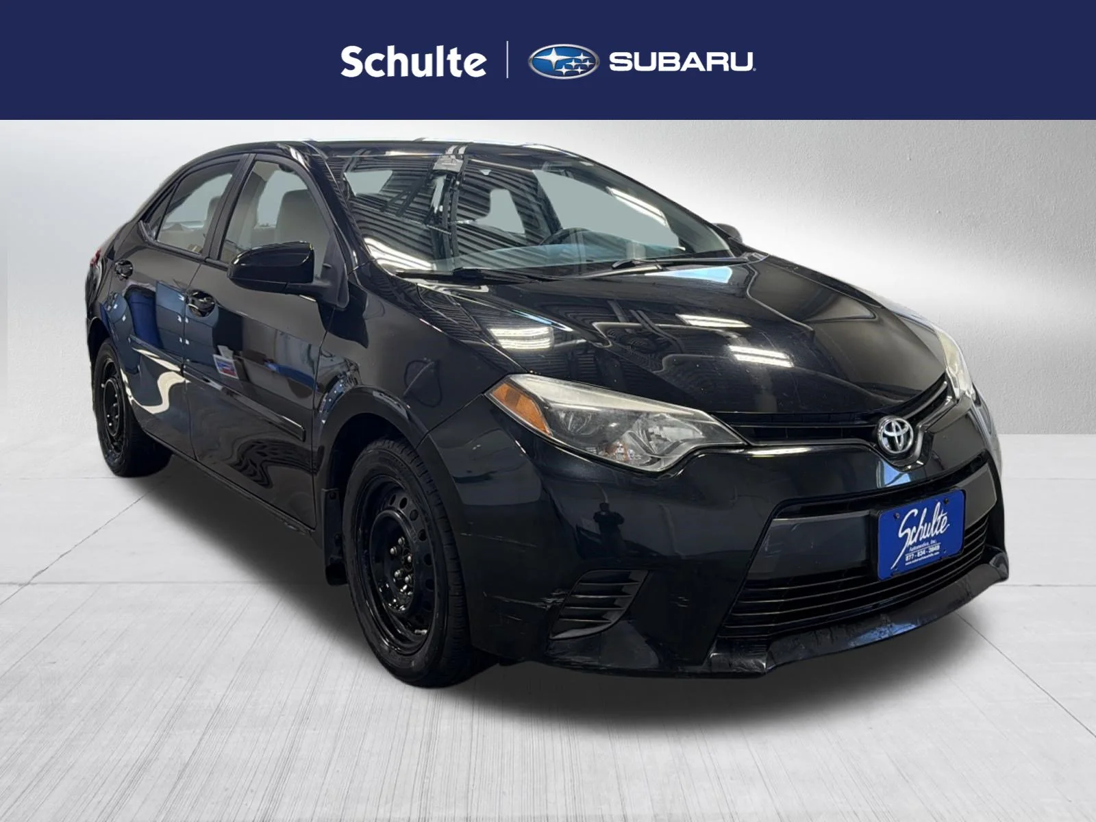 Used 2016 Black Sand Pearl Toyota LE image 1