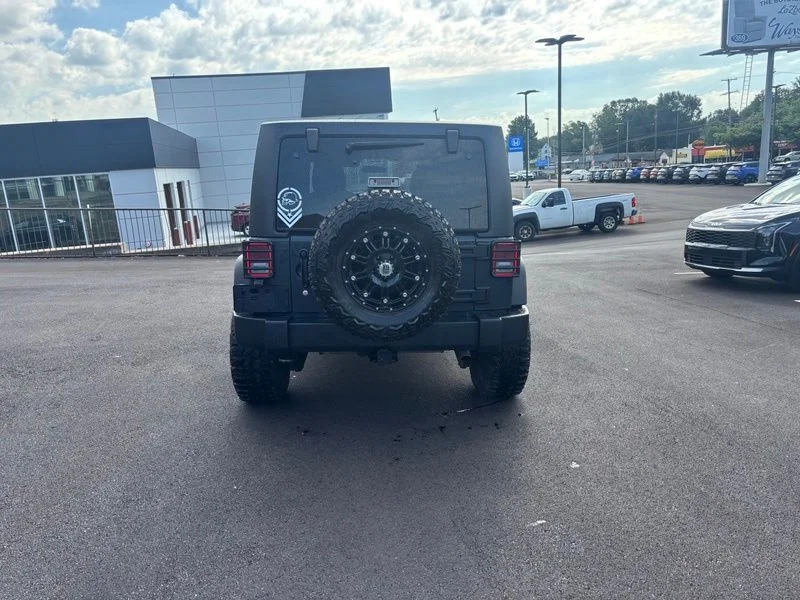 Used 2017 Black Jeep Unlimited Sport image 7