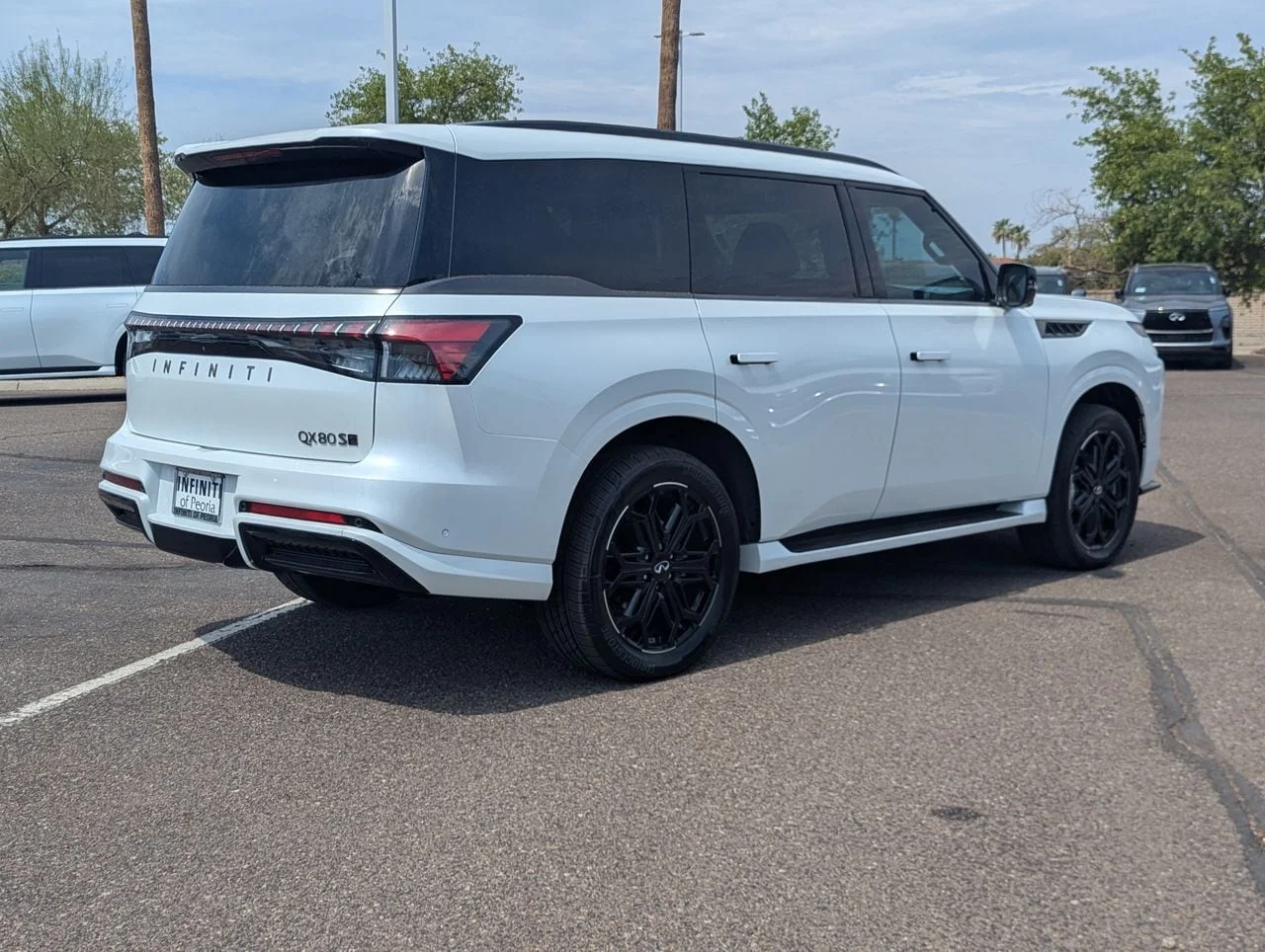 New 2027 RADIANT WHITE INFINITI Sport 4WD image 5
