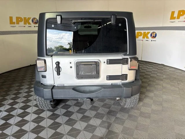 Used 2014 Billet Metallic Clearcoat Jeep Unlimited Sport image 4