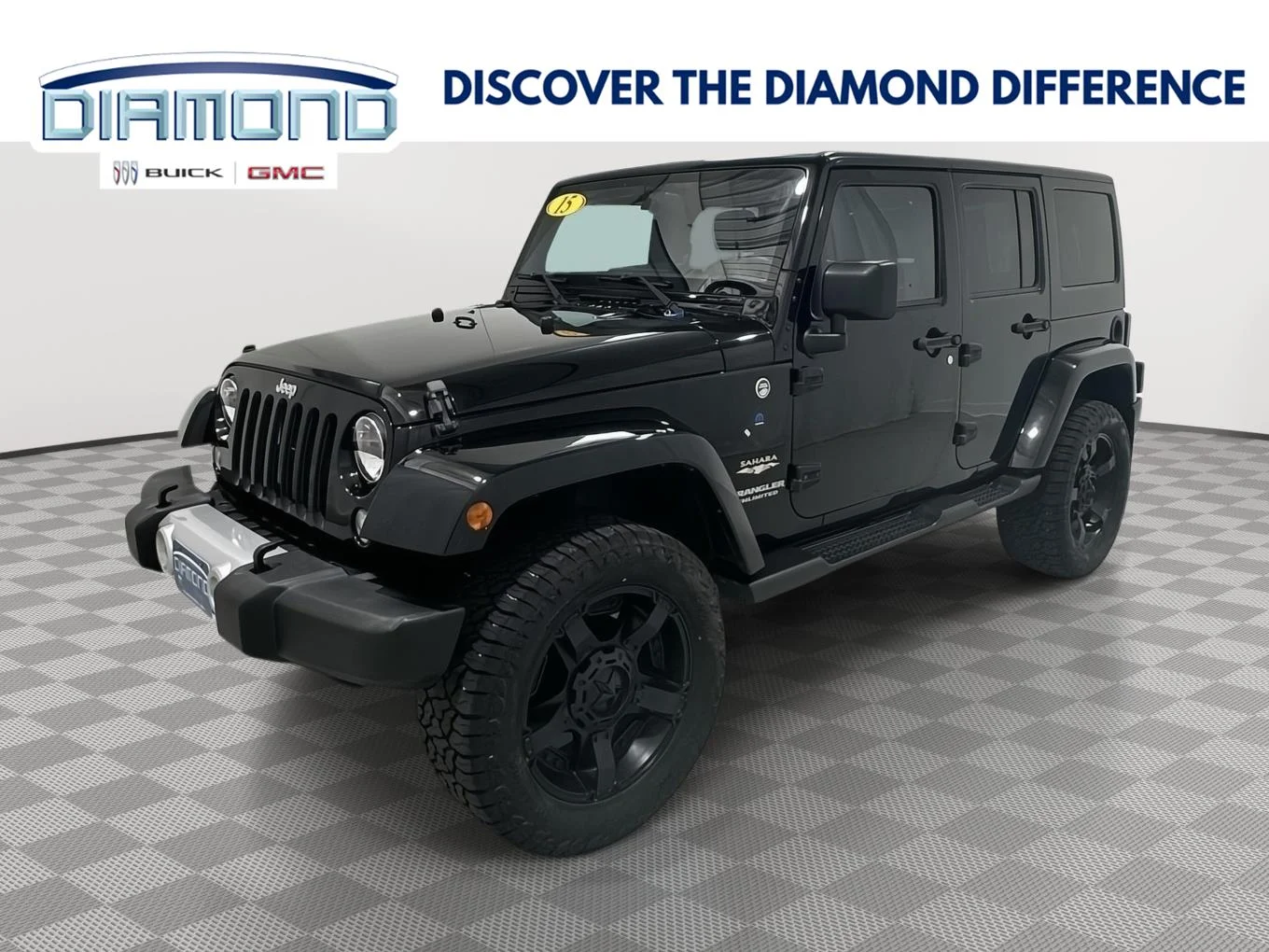 Used 2015 Black Jeep Sahara image 1