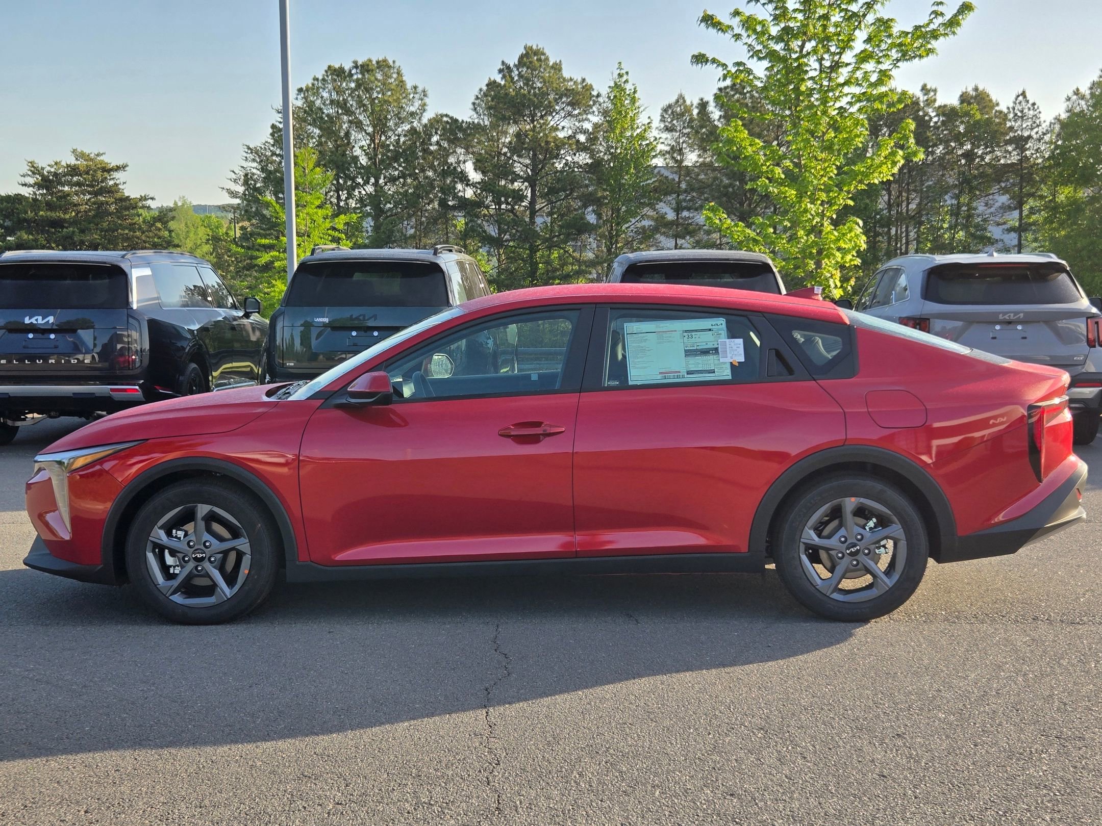 New 2026 Currant Red Kia LXS image 4