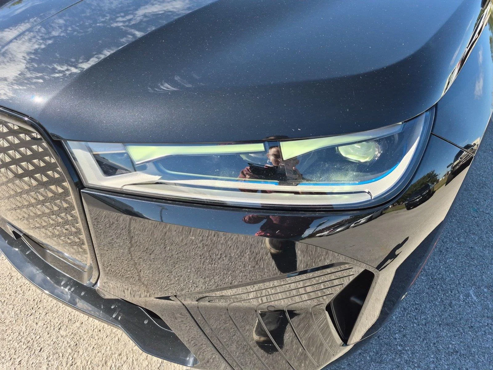Used 2024 Black Sapphire Metallic BMW xDrive50 image 9