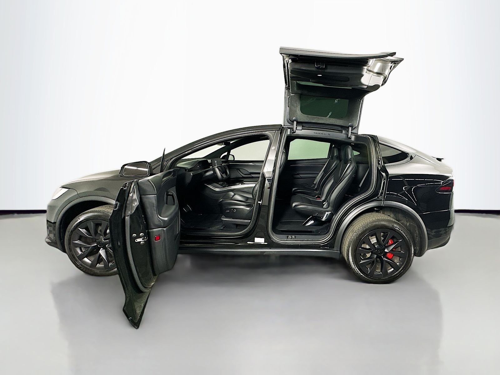 Used 2023 Solid Black Tesla Plaid image 33