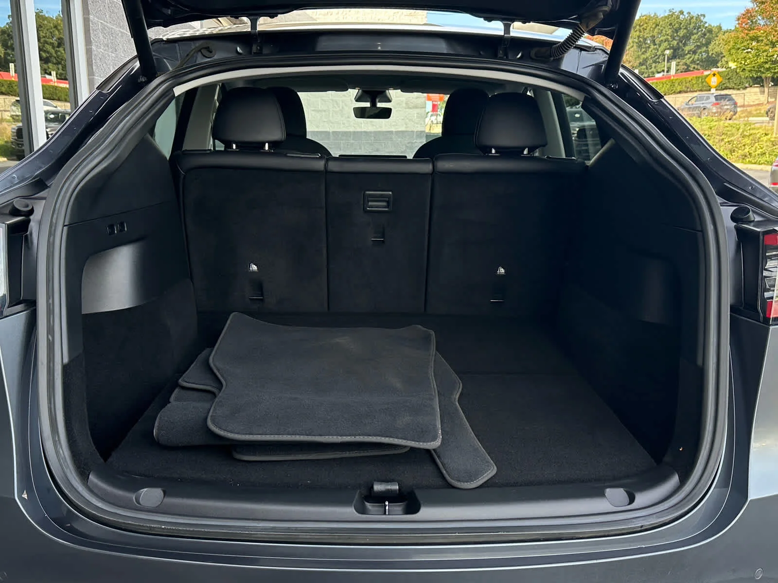 Used 2022 Solid Black Tesla Performance image 24