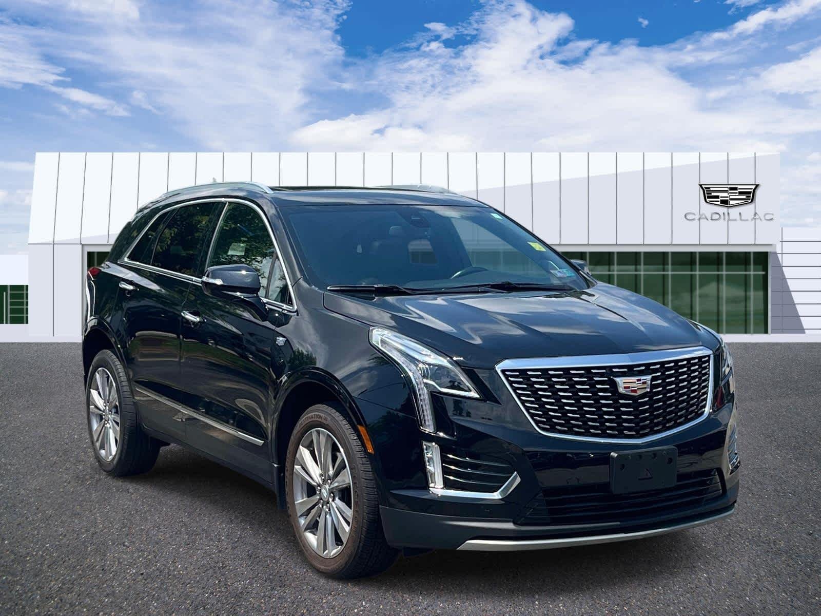 Used 2023 Stellar Black Metallic Cadillac Premium Luxury image 1