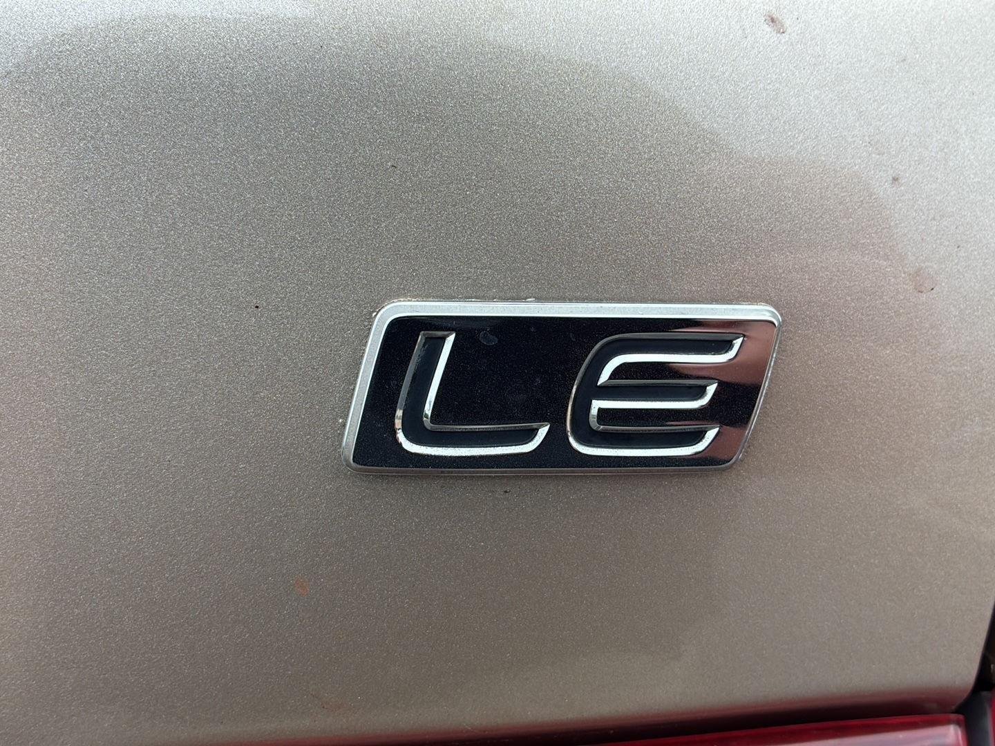 Used 2011 Sandy Beach Metallic Toyota LE image 6