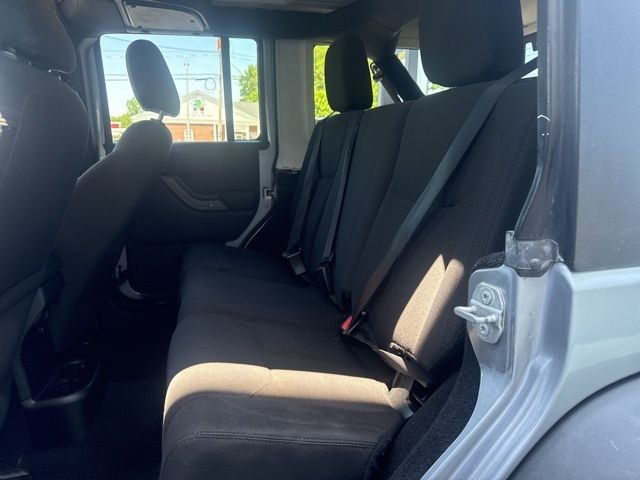 Used 2016 Billet Silver Metallic Clearcoat Jeep Unlimited Sport image 11
