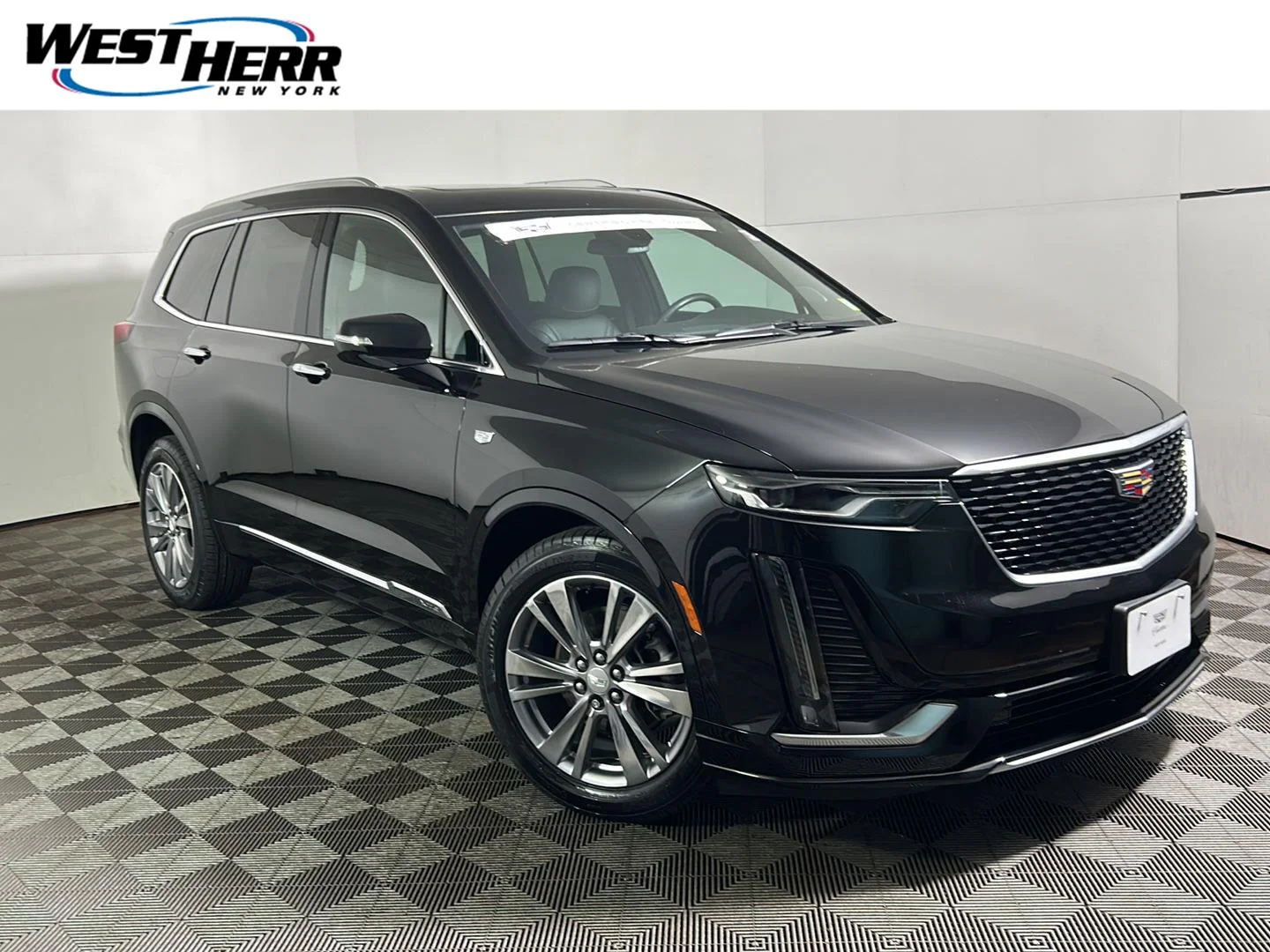 Used 2024 Stellar Black Metallic Cadillac AWD Premium Luxury image 1