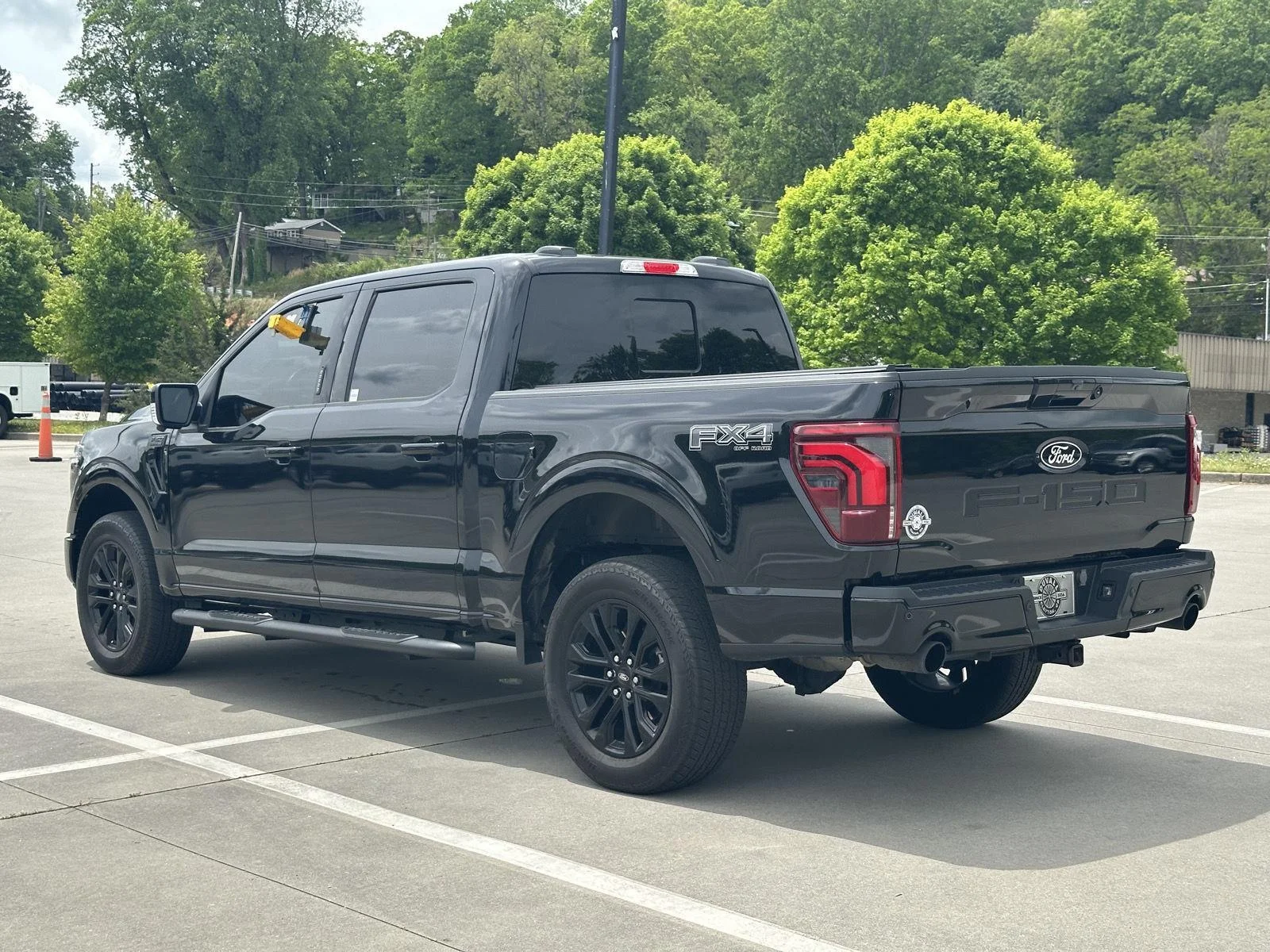 Used 2024 Agate Black Metallic Ford LARIAT image 4