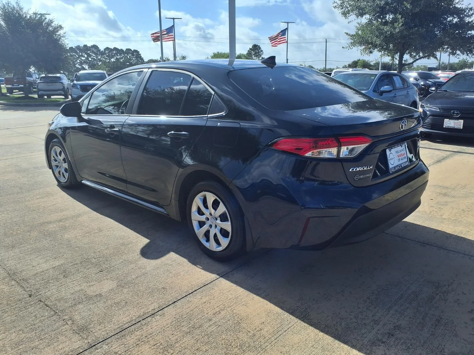Used 2026 Black Toyota LE image 3