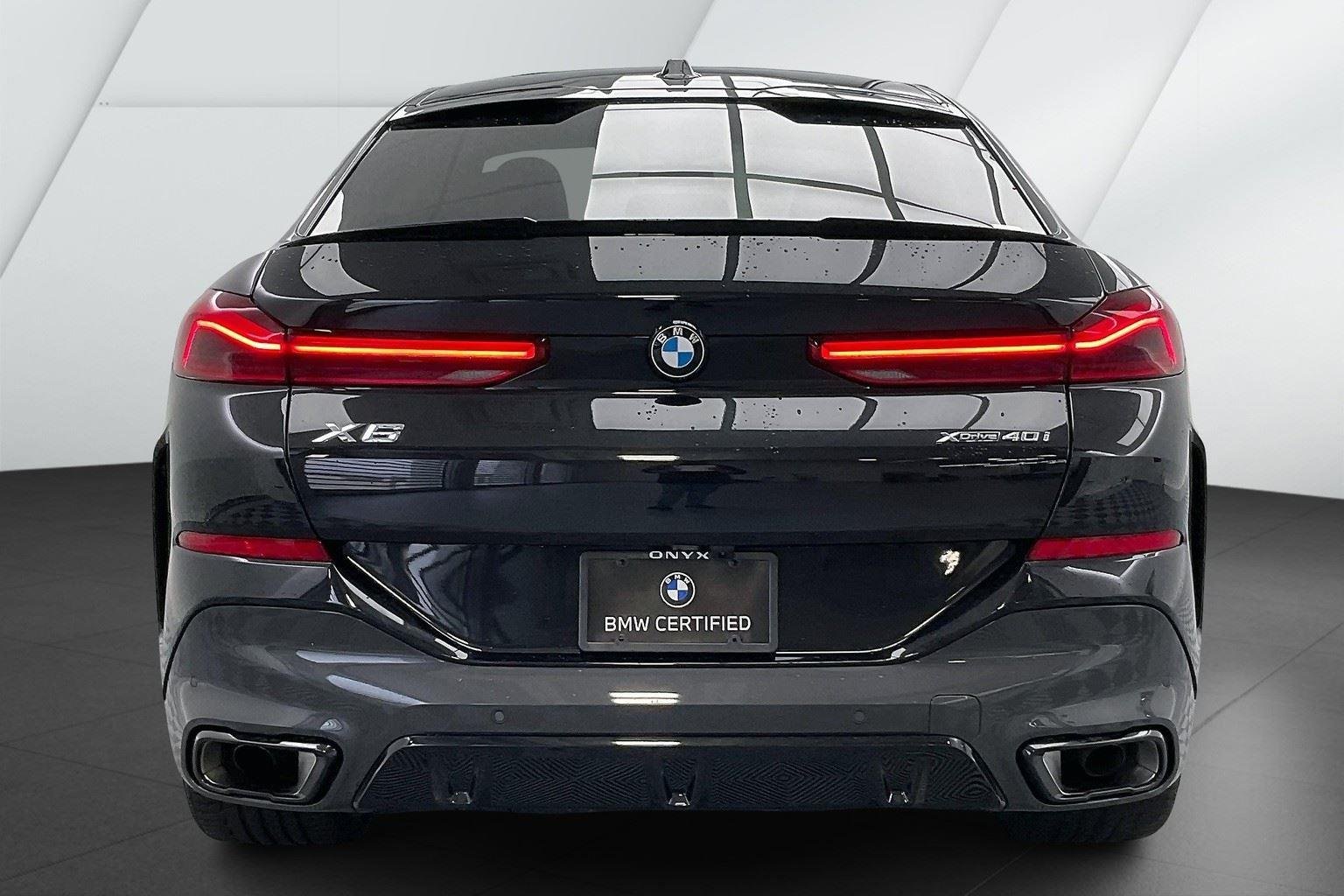 Certified Used 2025 Black Sapphire Metallic BMW xDrive40i image 3