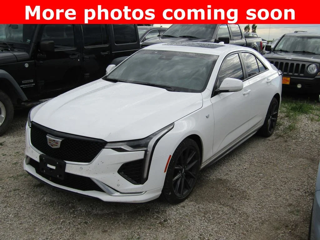 Used 2024 Summit White Cadillac Sport image 1
