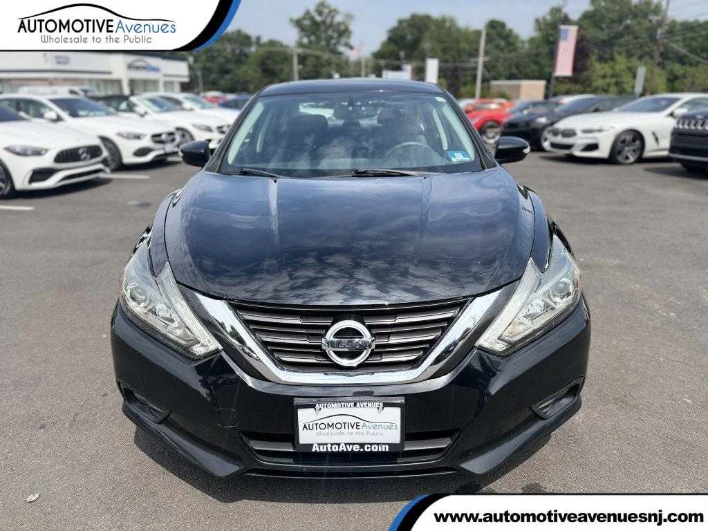 Used 2016 Super Black Nissan 4dr Sedan I4 2.5 SL image 1