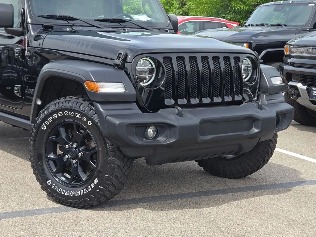 Used 2020 Black Jeep Unlimited Sport image 2