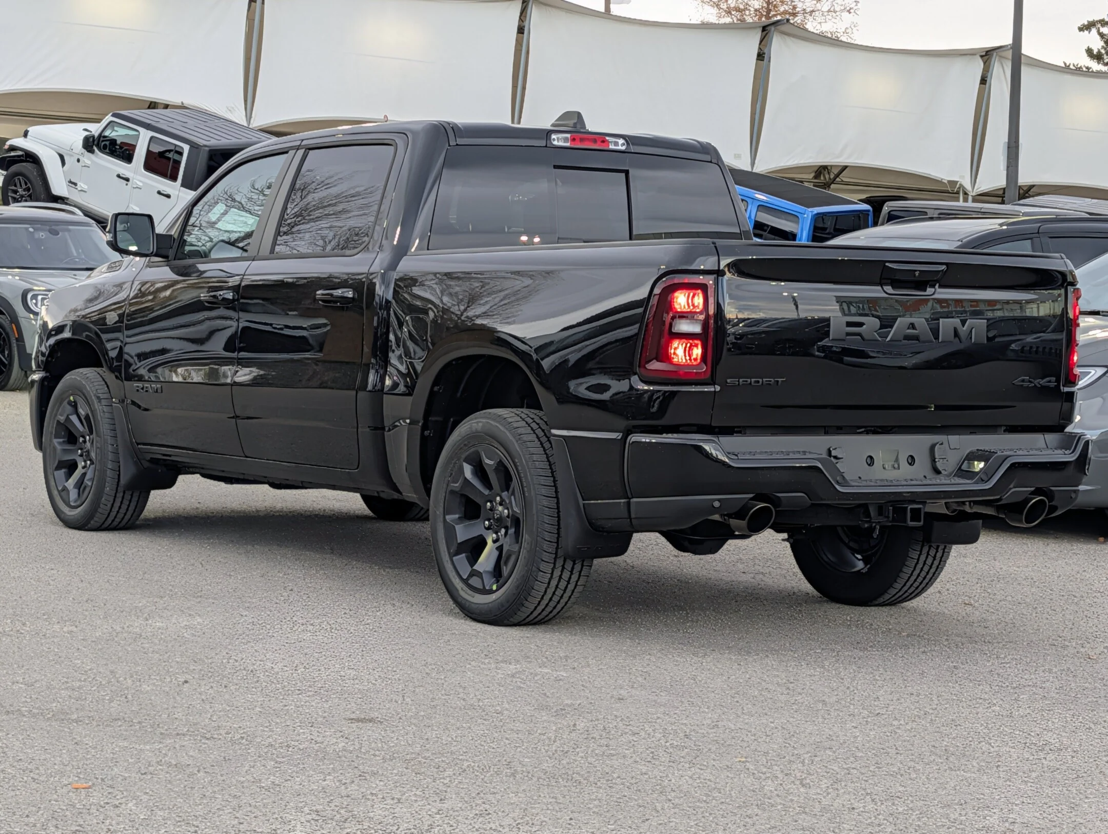 New 2027 Black RAM Sport - - 3.92 Rear Axle - Trailer Brake Control - Trailer Sway Control - Hill Start Assist & More! image 6