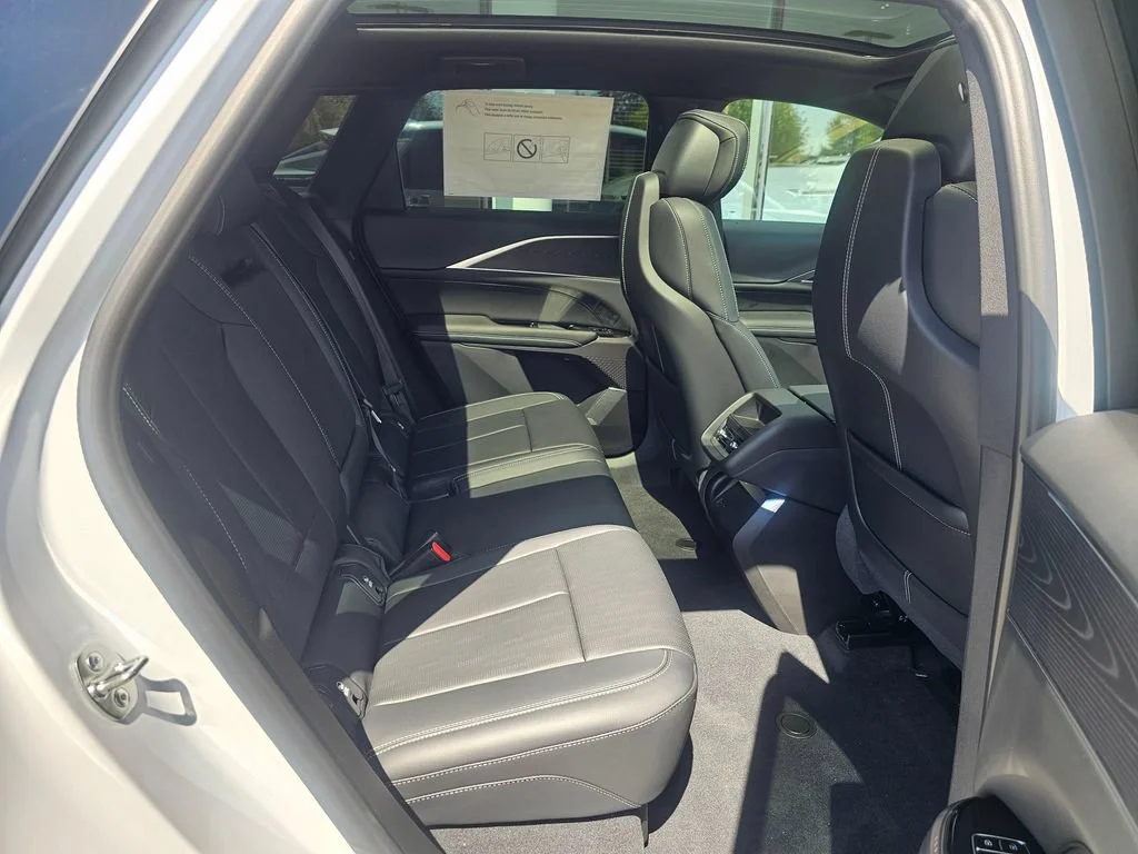 New 2026 Vibrant White Tricoat Cadillac Sport image 12