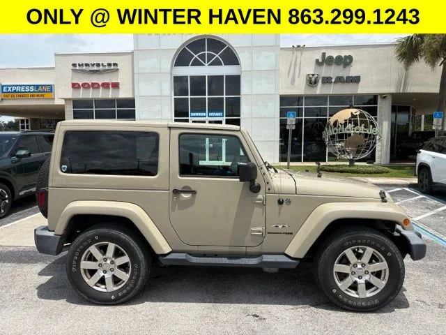 Used 2018 Beige Jeep Sahara image 1