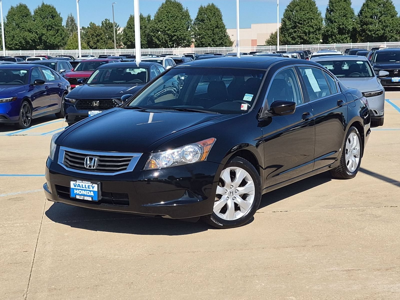 Used 2010 Crystal Black Pearl Honda EX-L Sedan image 2