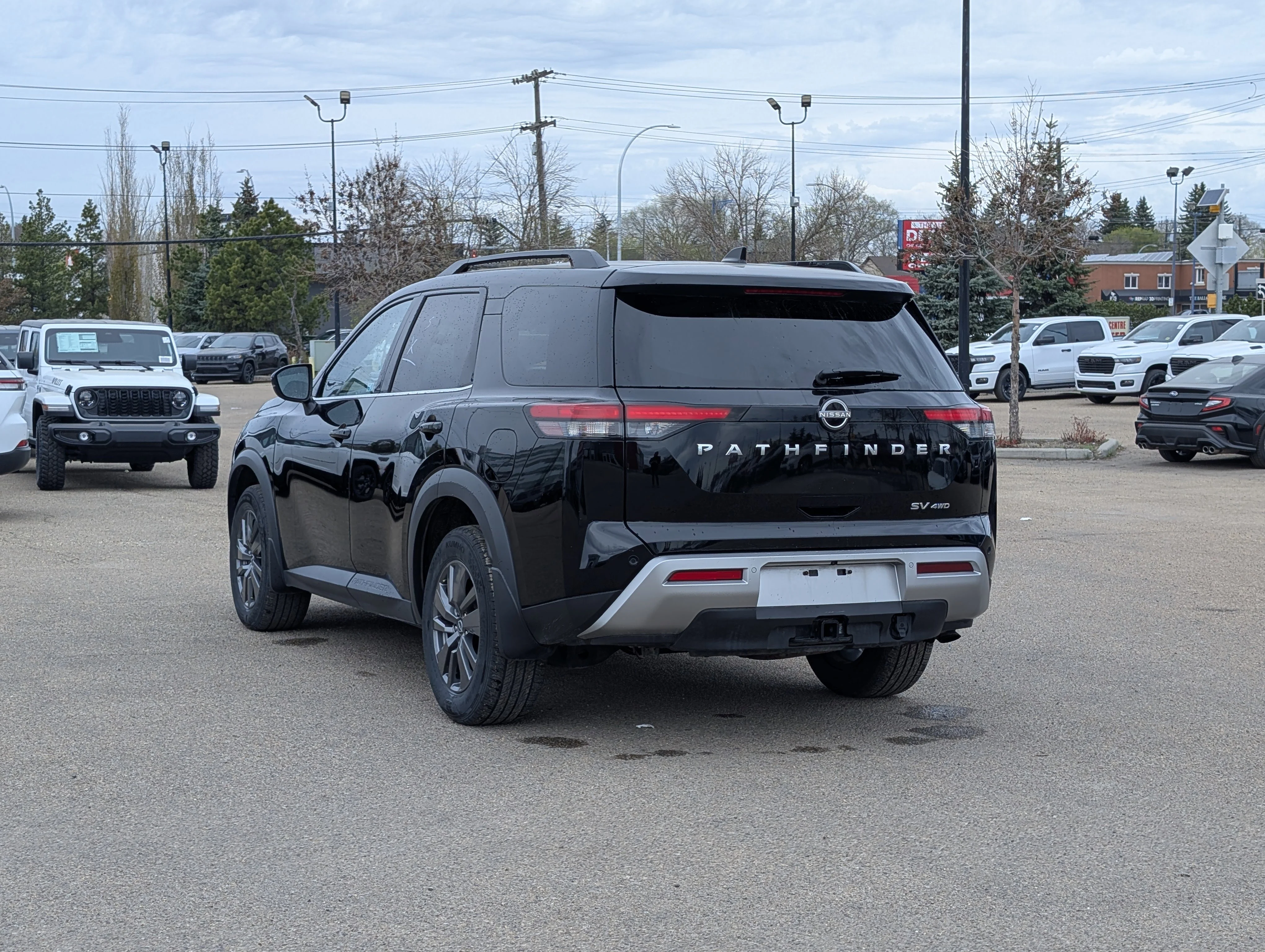 Used 2024 Gun Metallic Nissan SV image 4