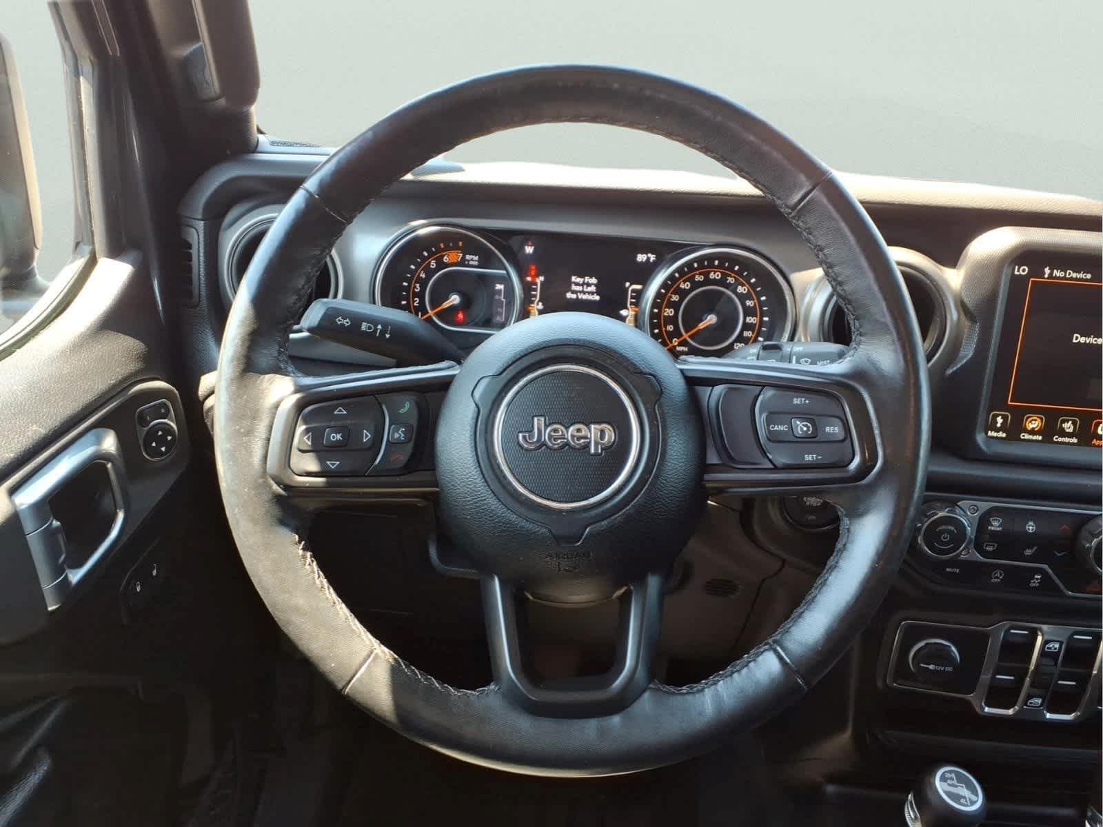Used 2023 Granite Crystal Metallic Clearcoat Jeep Sport S image 18