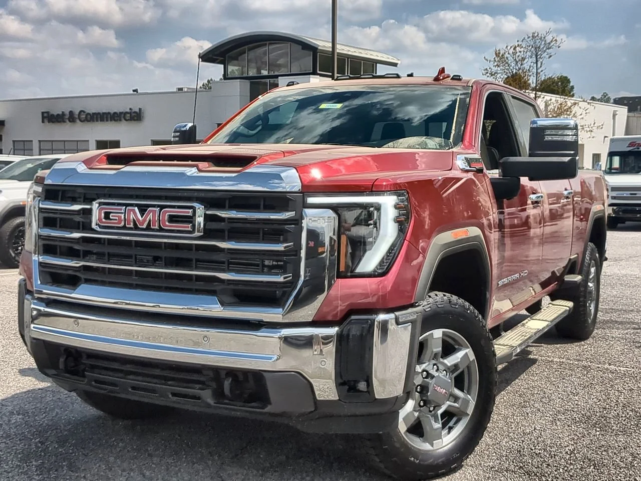New 2026 Volcanic Red Tintcoat GMC SLT image 1