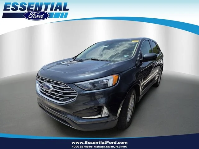 Used 2022 Blue Metallic Ford SEL image 1