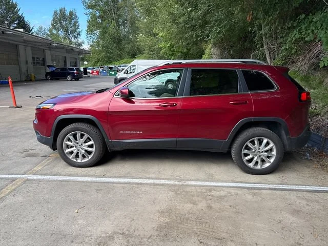 Used 2015 Deep Cherry Red Crystal Pearlcoat Jeep Limited image 4