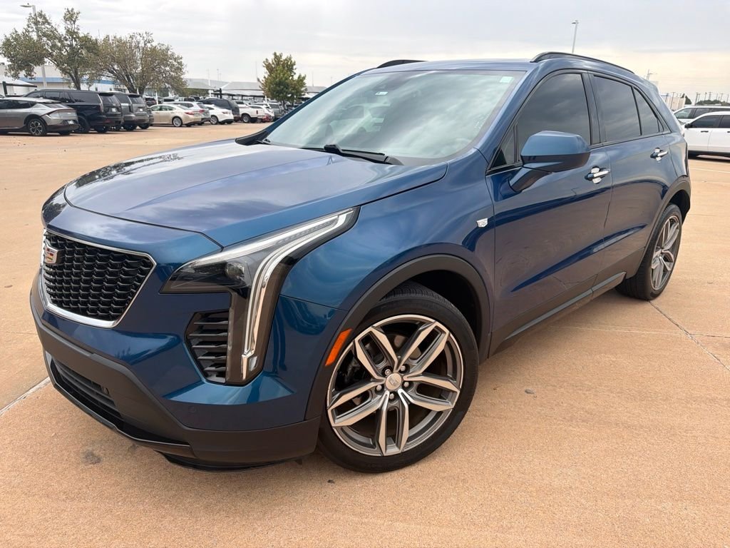 Used 2019 Blue Cadillac Sport image 1