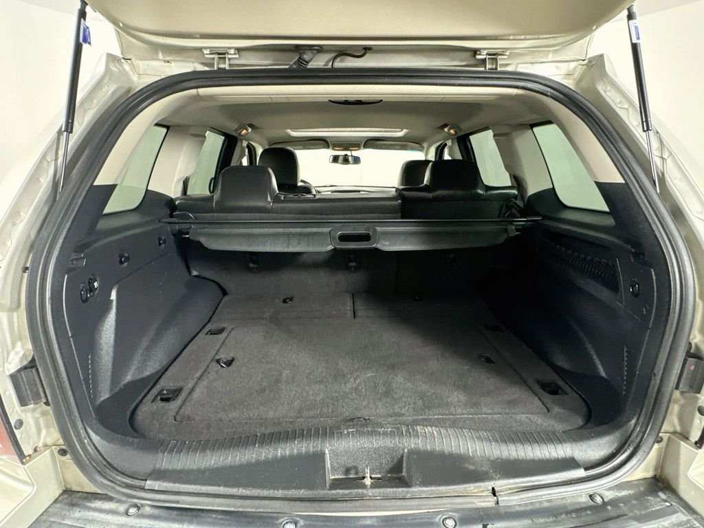 Used 2010 Light Graystone Pearlcoat Jeep Laredo image 31