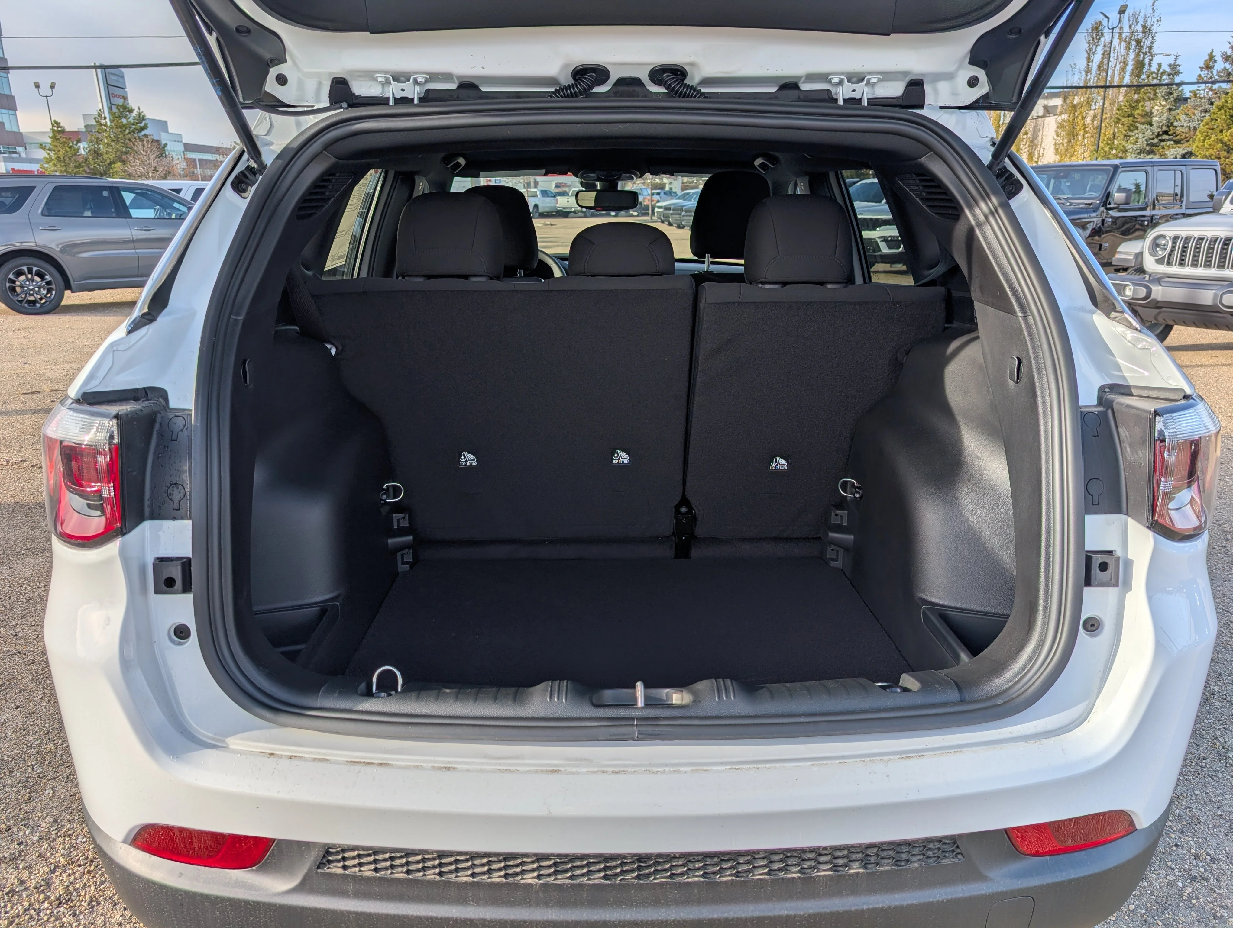 New 2026 Bright White Jeep Sport image 6