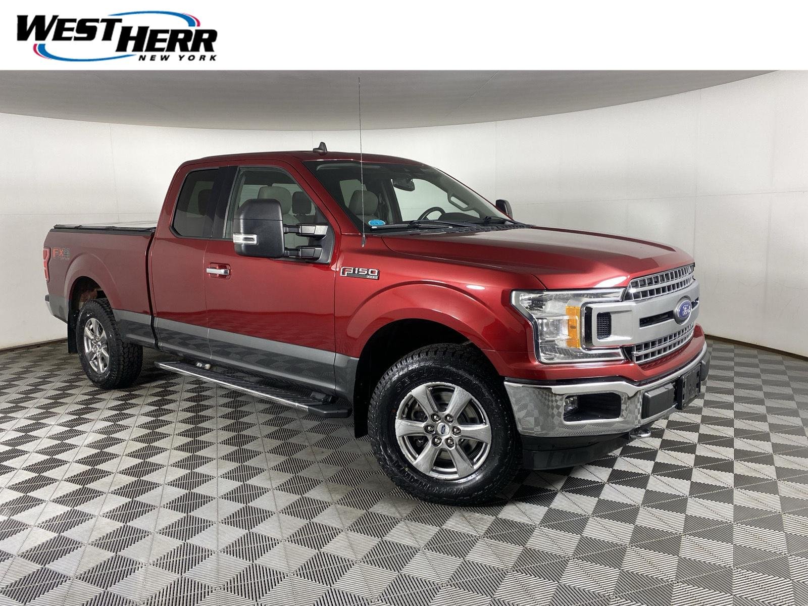 Used 2019 Ruby Red Metallic Tinted Clearcoat/Magnetic Ford XLT image 1
