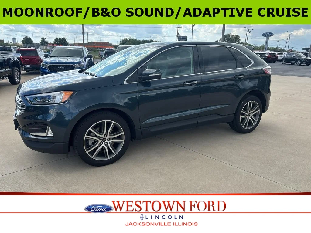 Used 2024 Stone Blue Metallic Ford Titanium image 1
