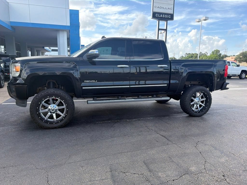 Used 2014 ONYX BLACK GMC Denali image 1