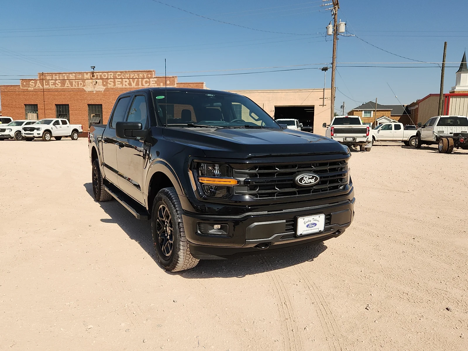 New 2026 Agate Black Metallic Ford XLT image 1