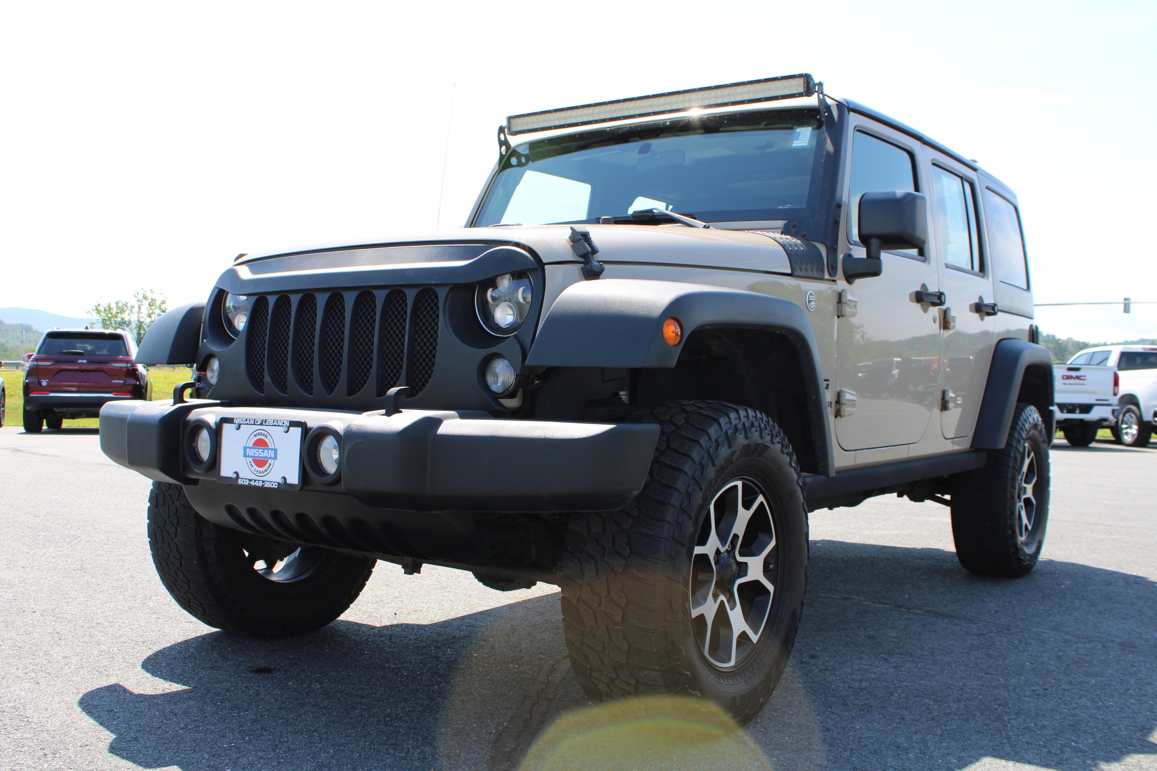 Used 2016 Mojave Sand Clearcoat Jeep Sport image 1