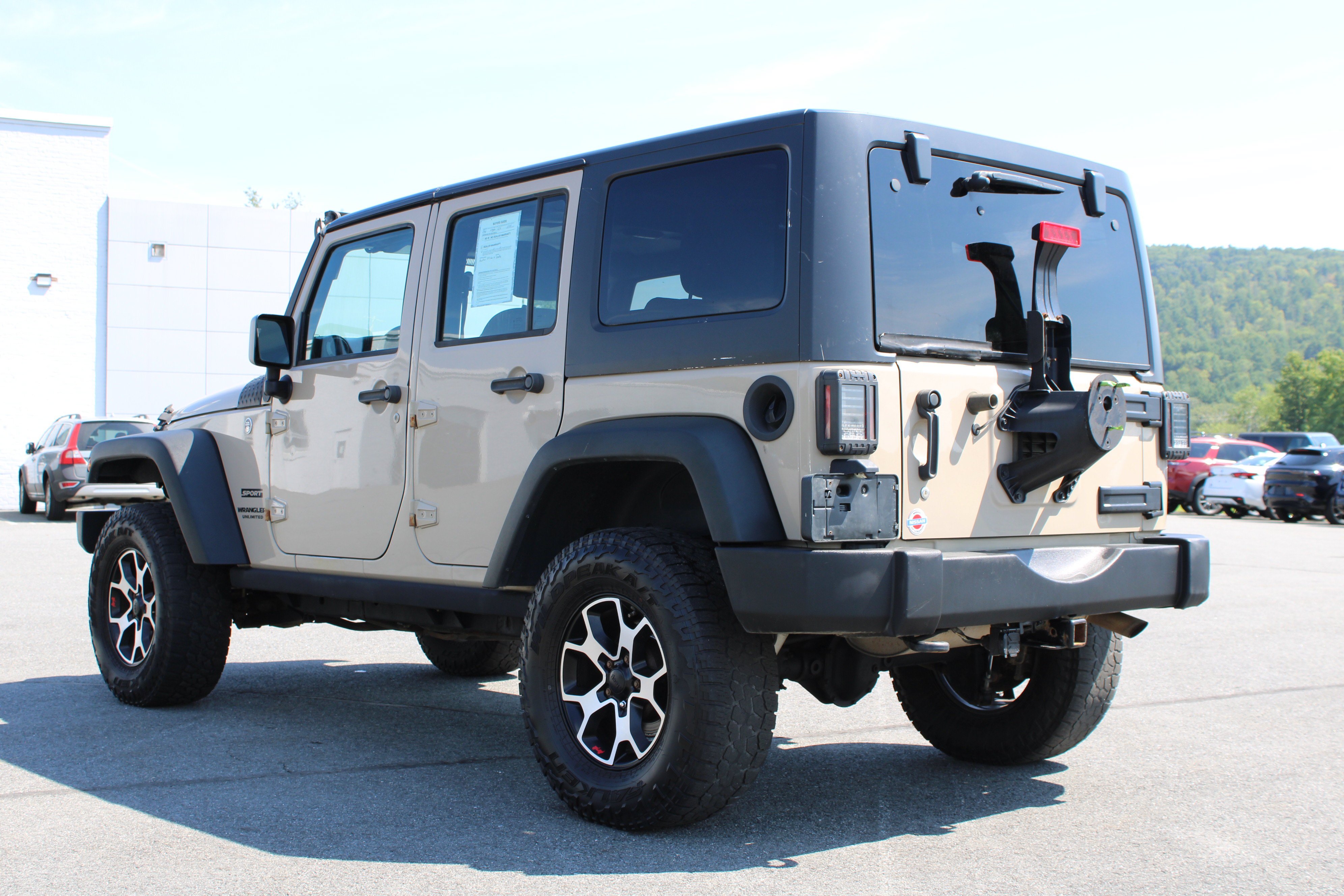 Used 2016 Mojave Sand Clearcoat Jeep Sport image 11