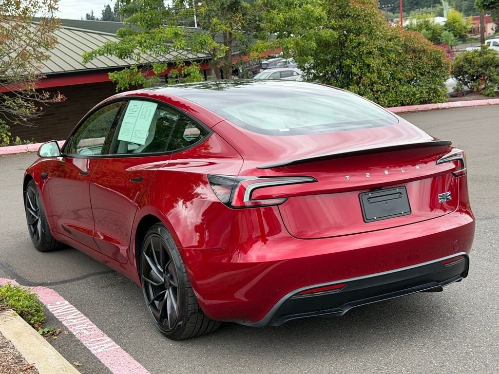 Used 2025 Red Tesla Performance image 4