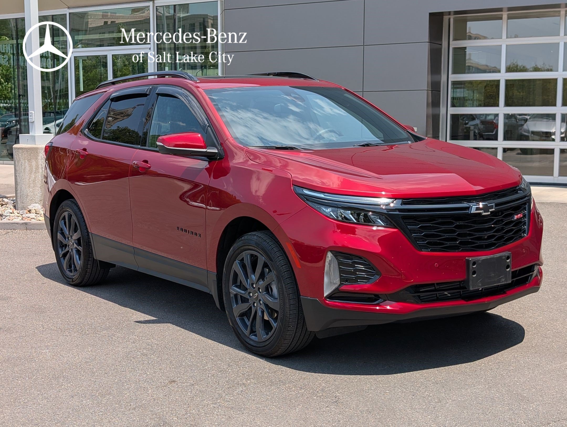 Used 2024 Radiant Red Tintcoat Chevrolet RS image 1