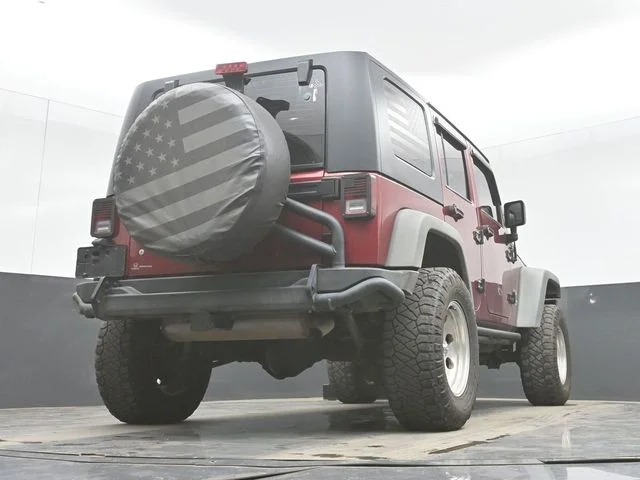 Used 2012 Red Jeep Unlimited Sport image 31
