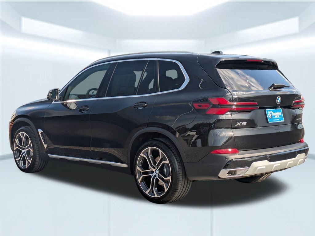 New 2026 Black Sapphire Metallic BMW sDrive40i image 3