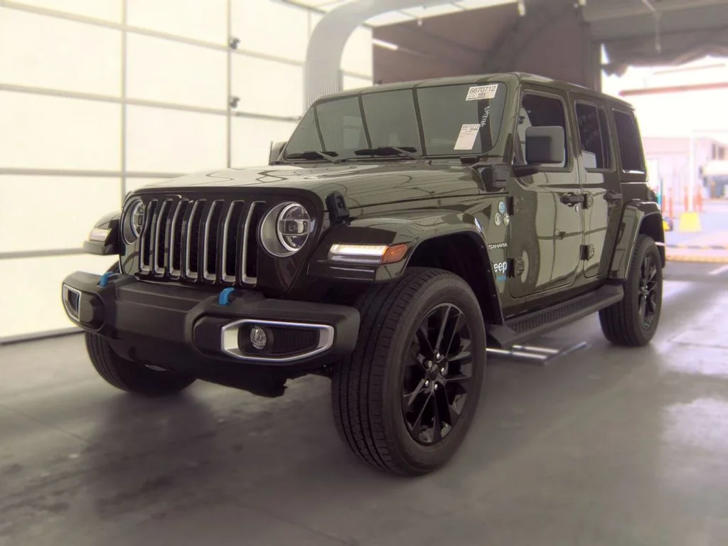 Used 2022 Green Jeep Unlimited Sahara 4xe image 1