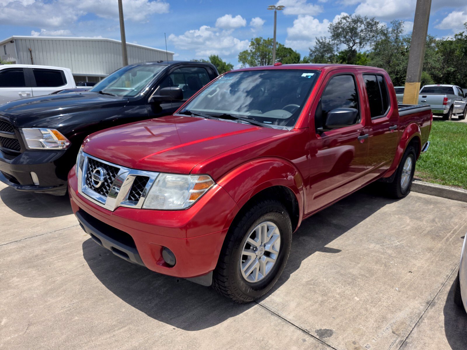 Used 2017 Lava Red Nissan SV image 2