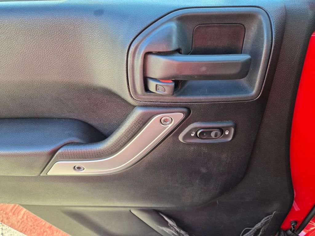 Used 2015 Red Jeep Unlimited Sahara image 18