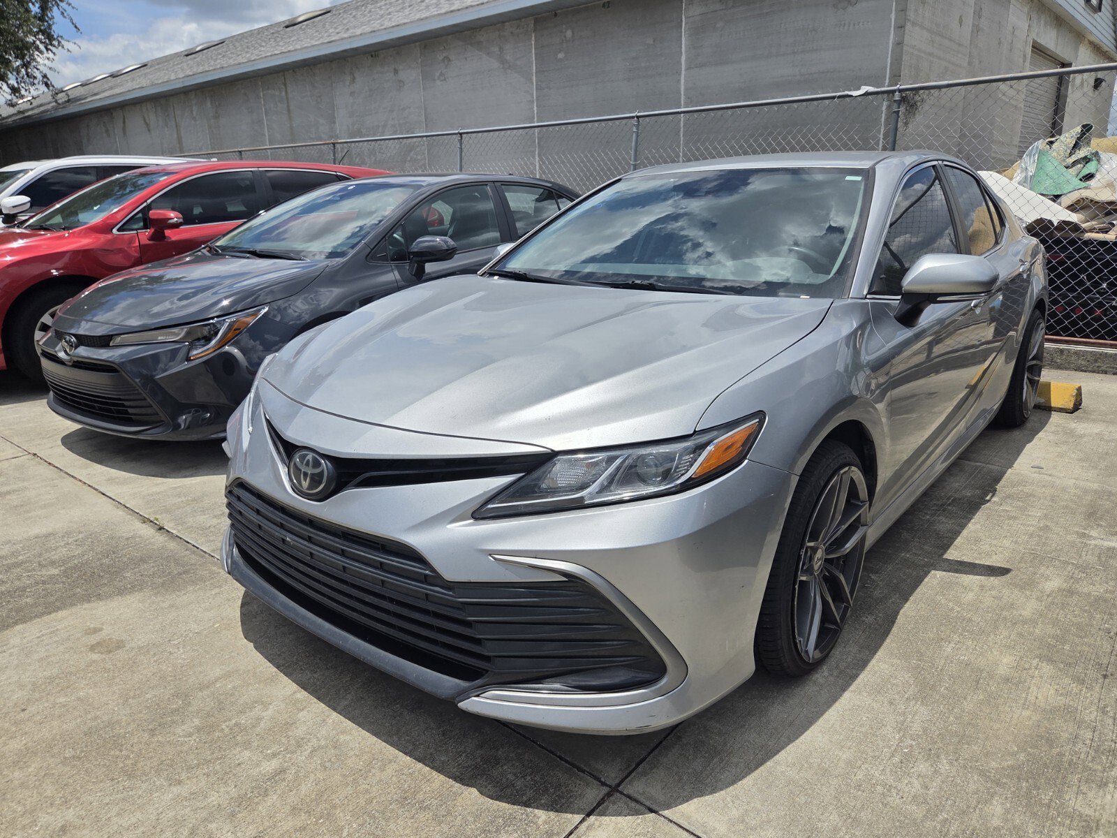Used 2022 Celestial Silver Metallic Toyota LE image 1