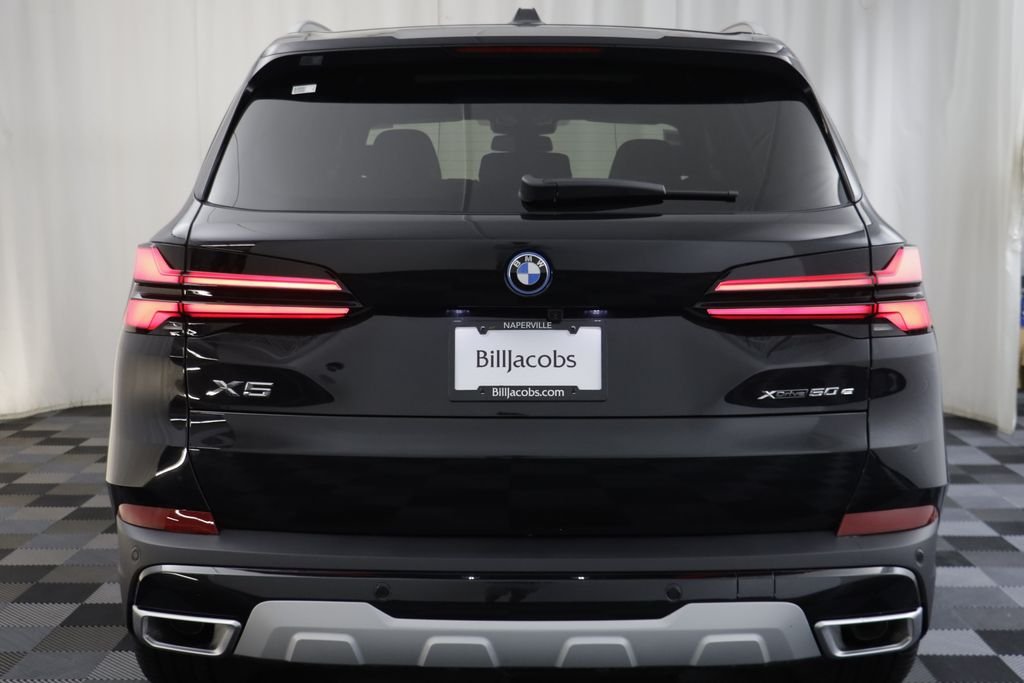 New 2026 Black Sapphire Metallic BMW xDrive50e image 17
