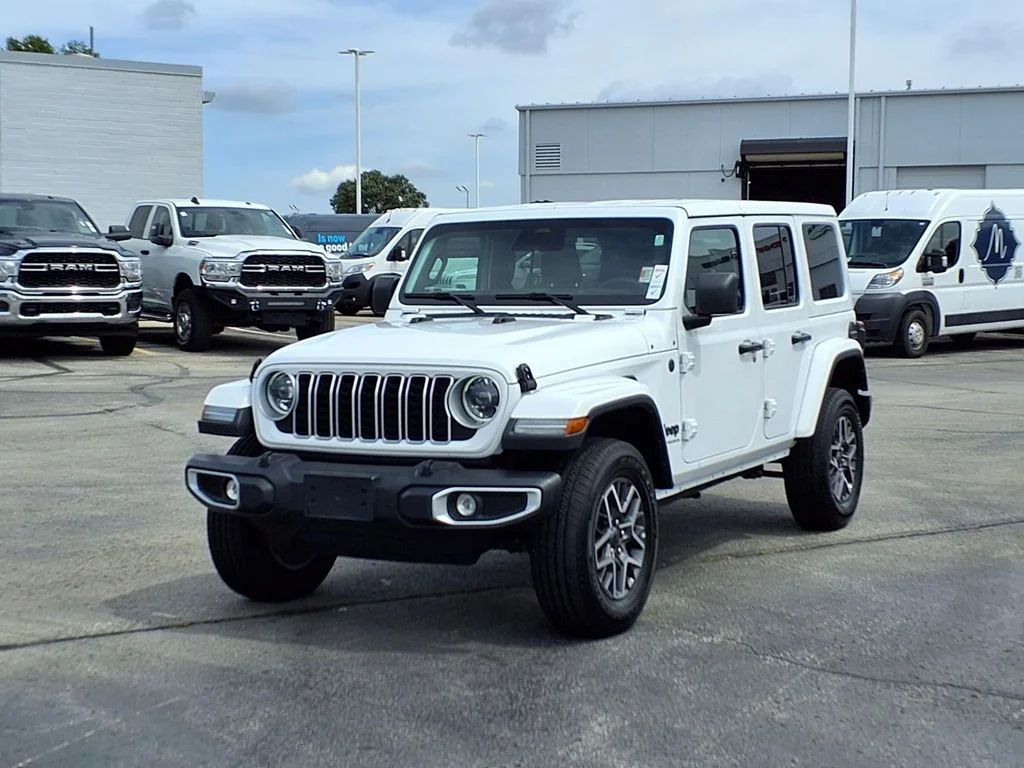 Used 2025 Jeep Wrangler 4-Door Sahara with VIN 1C4PJXEN2SW587567 for sale in Kansas City
